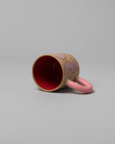 View inside of the Recreation Center Pink Shapes & Pink Handle Shapes Mug on light color background.
