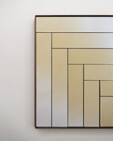 Closeup details of the Bower Studios Lattice Mirror 2 on light color background.