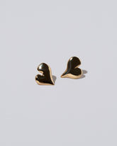 Thousand & One Night Heart Stud Earrings on light color background.
