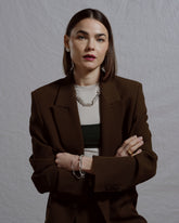 Styled image featuring CRZM jewelry on model.