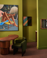 Styled image featuring the Bower Studios Lattice Mirror 3 and the Low-Back Melt Accent Chairs in the Mociun Showroom.