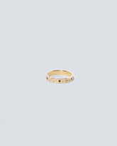 Gold with Little Array Black & White Diamonds 2.5mm Square Wire Band on light color background.