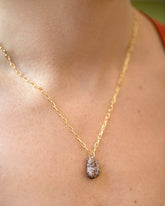 Bengal Curled-Up Cat Charm paired with 3.5mm Lightweight Beveled Oval Chain Necklace on model.