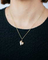 Hot Dog Chain Necklace and Gold Grand Thousand & One Night Heart Charm on model.