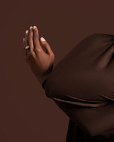 Styled image featuring the Contort Ring on model.