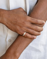 Gold Arcade Ring on male model.