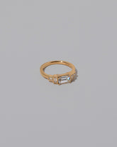 View from the side of the Diamond Expression Ring on light color background.