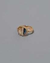 View from the side of the Opulence Ring on light color background.