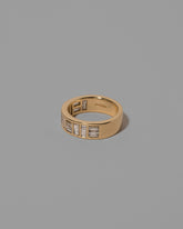 View from the side of the Mega Piet Ring on light color background.