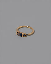 View from the side of the Dearest Ring on light color background.