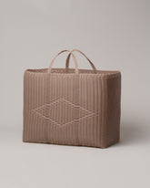 Palorosa Powder Extra Large Handwoven Tote Basket Bag on light color background.