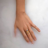 product_details::Styled image featuring the Blue Sapphire Level Ring, Green Sapphire Level Ring and Bicolor Sapphire Grand Align Rings.