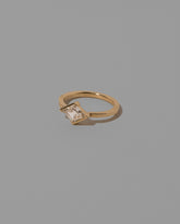 View from the side of the Benevolence Ring on light color background.