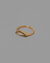 View from the side of the Tenderness Ring on light color background.