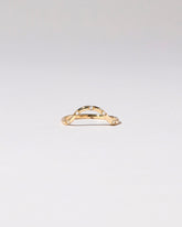 Gold White Diamond Five Stone Curve Band on light color background.