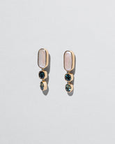 Luster Earrings on light color background.