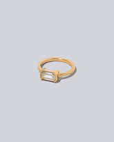 View from the side of the Analogue Ring on light color background.