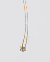 Apposition Necklace on light color background.