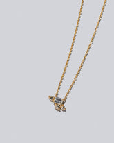 Cosmic Dawn Necklace - White Diamonds on light color background.
