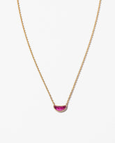 Desire Necklace on light color background.