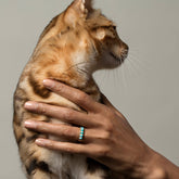 product_details::Gold Turquoise Five Triangle Ring on model.