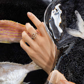 product_details::Styled image featuring the Gold White Diamond Tsunami Ring on model.