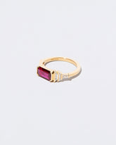View from the side of the Femme Volage Ring on light color background.
