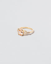 Qualia Ring on light color background.