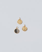 Black & White Cookie Charm and Chocolate Chip Cookie Charms on light color background.