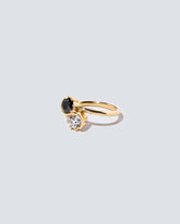Sun & Moon Union Ring on light color background.