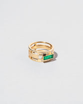 Sleeping Figure Ring on light color background.