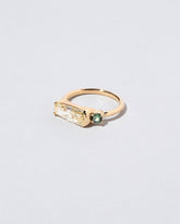 Immanence Ring on light color background.