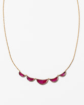 Invincibility Necklace on light colored background