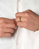 Gold 5mm Knife Edge Band on male model.