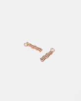 Closeup details of the Bacon Charms on light color background.