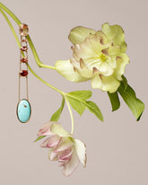 Oregon Sunstone & Persian Turquoise Earrings on light color background.