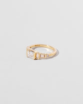 Elpis Ring on light color background.