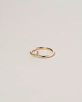 Stacked Ring - White Diamond on light color background.