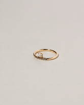 Stacked Ring - White & Black Diamond on light color background.