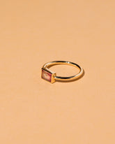View from the side of the Pink & White Tourmaline Ring on light color background.