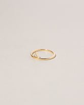 Stacked Ring - Triangle on light color background.