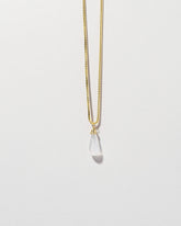 Moonstone Drop Pendant on light color background.