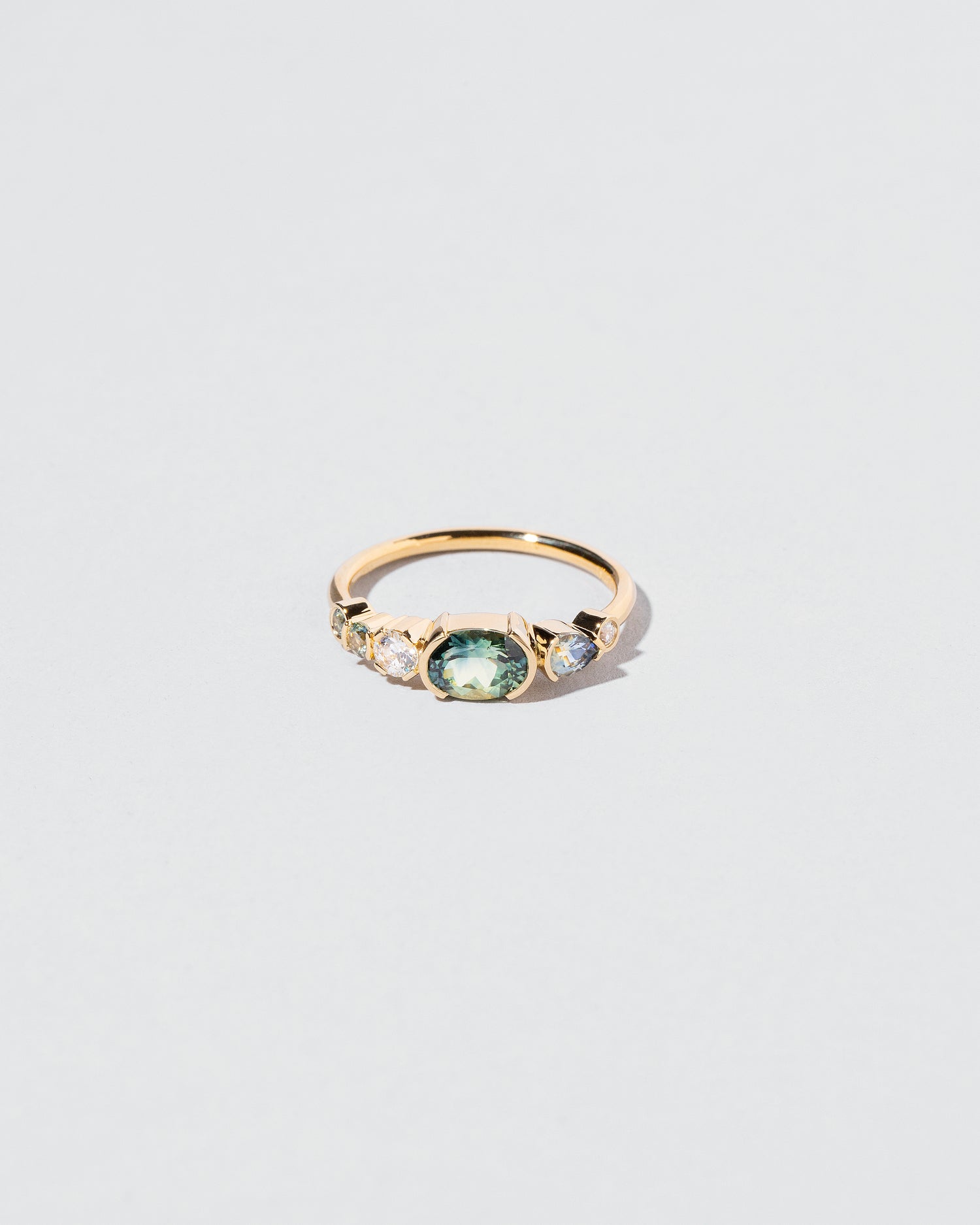 Bicolor Oval Sapphire & Diamond Line Cluster Ring front facing