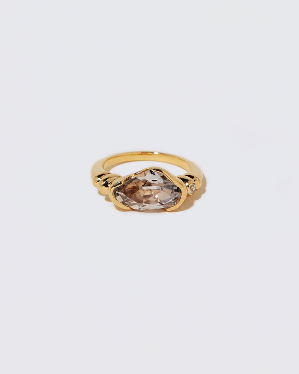 Custom by Mociun Top Notch Faceting Cut Madagascan Sapphire Ring on light color background.