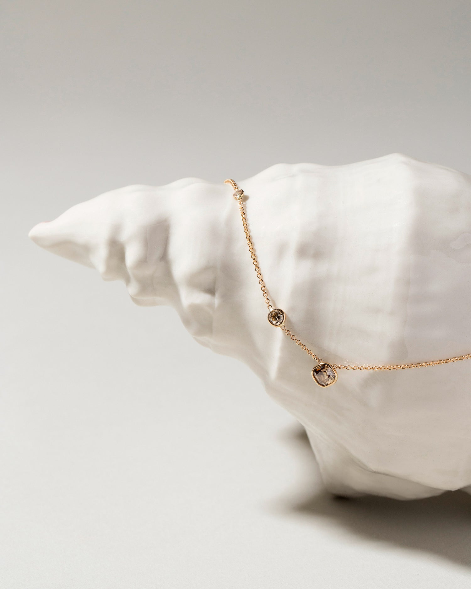 Three Stone Bezel Set Champagne Diamond Necklace styled