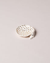 Eleonor Boström Dots Mini Dog Dish on light color background.