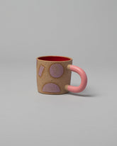 Recreation Center Pink Shapes & Pink Handle Shapes Mug on light color background.