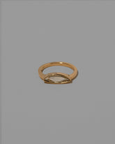 Tenderness Ring on light color background.