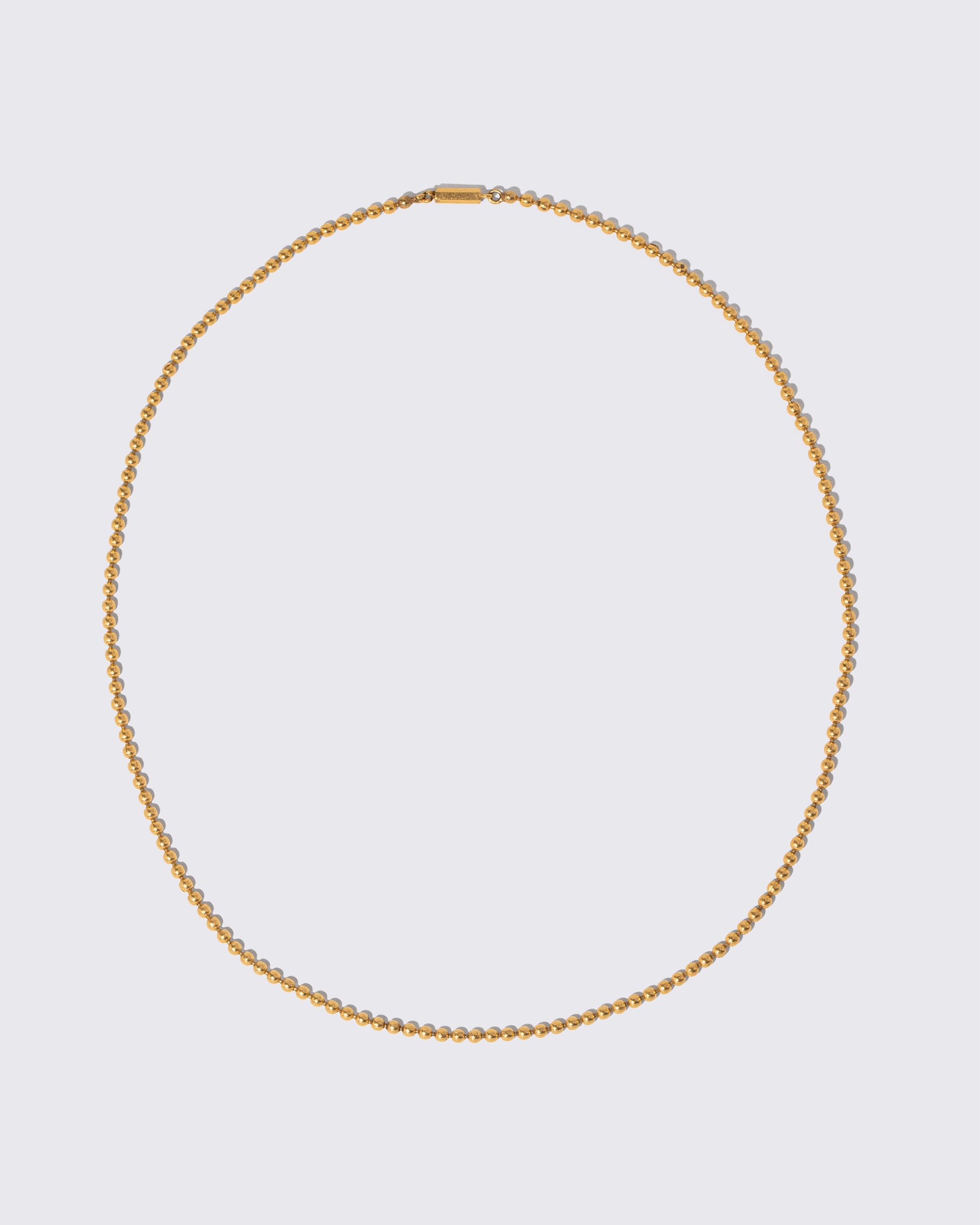 Vintage Ball Chain Necklace on light color background.