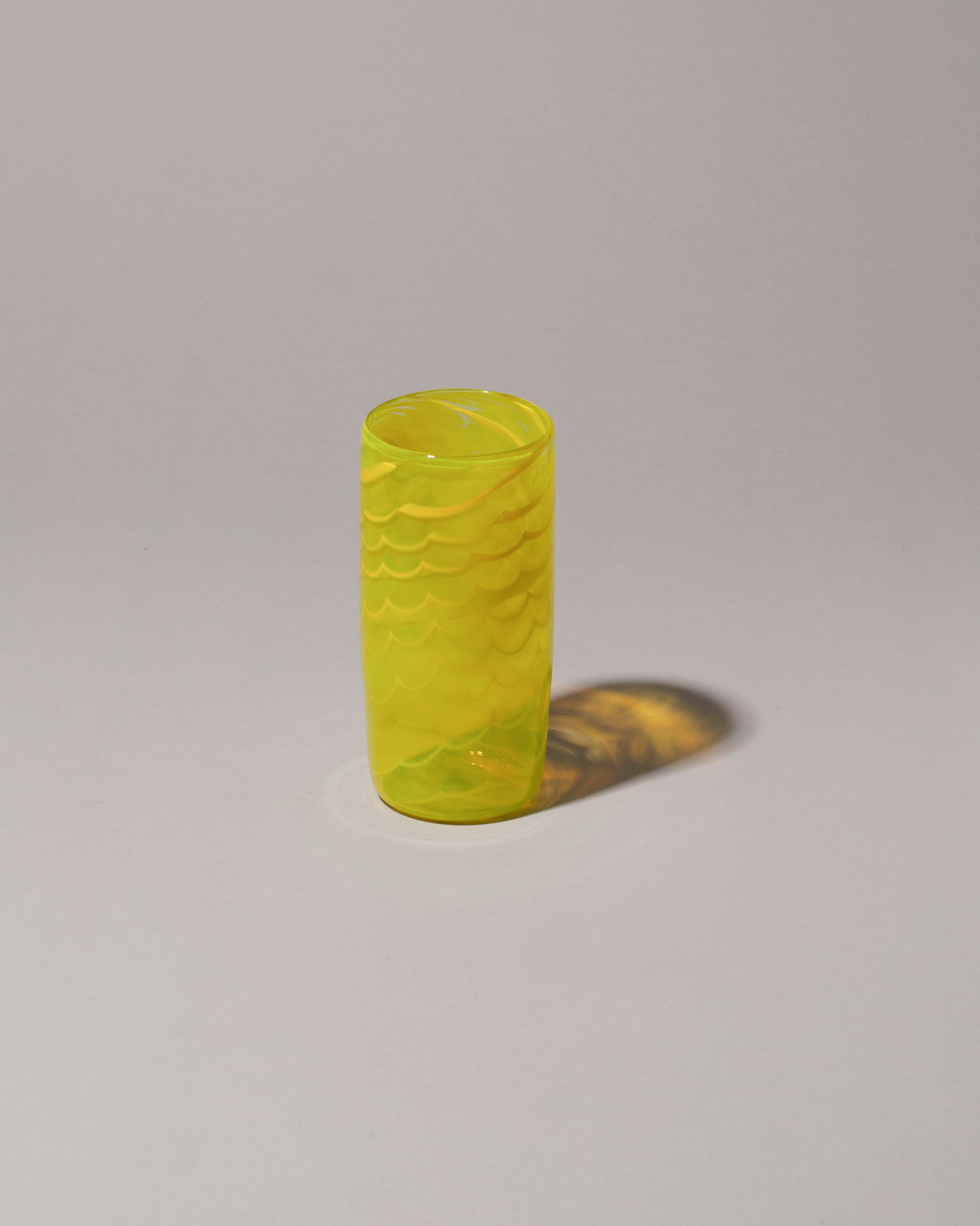 Sirius Glassworks Pure Sunshine Tumbler on on light color background.